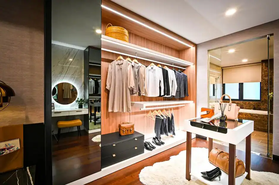 A walk-in closet with bright LED lighting