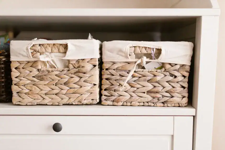 Woven storage baskets arranged neatly on a shelf