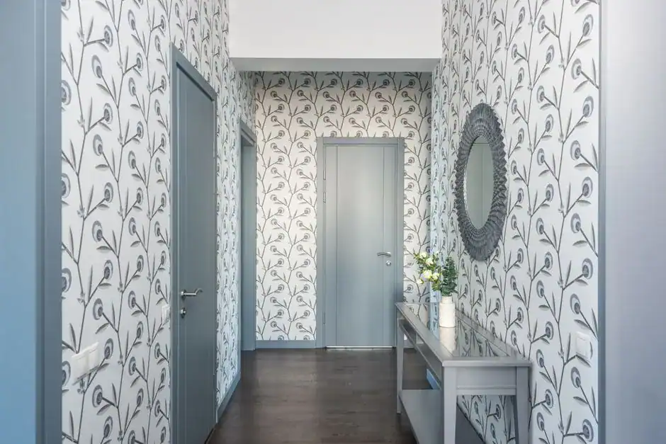 A welcoming entryway with a console table and mirror