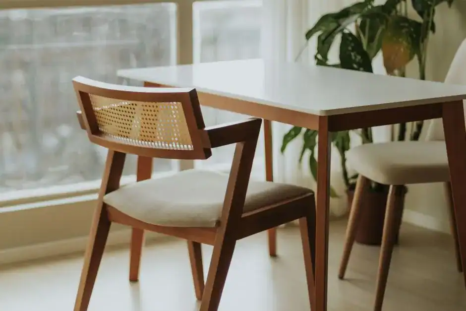 A well-made wooden cane-back chair