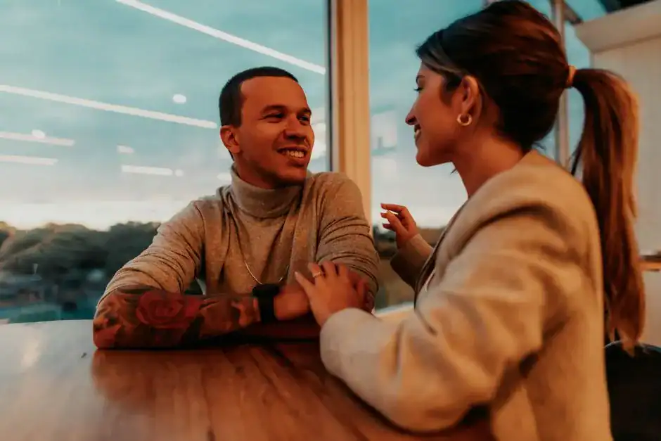 Two people in a warm, engaged conversation