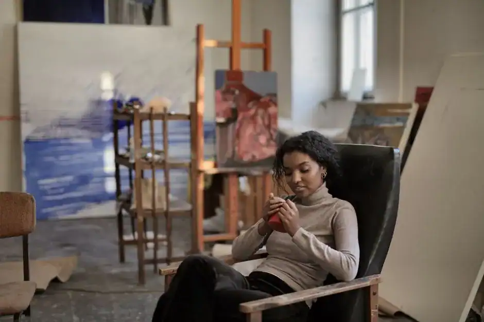 A woman painting in her art studio