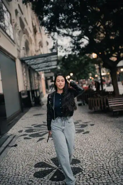 A confident woman walking alone in the city