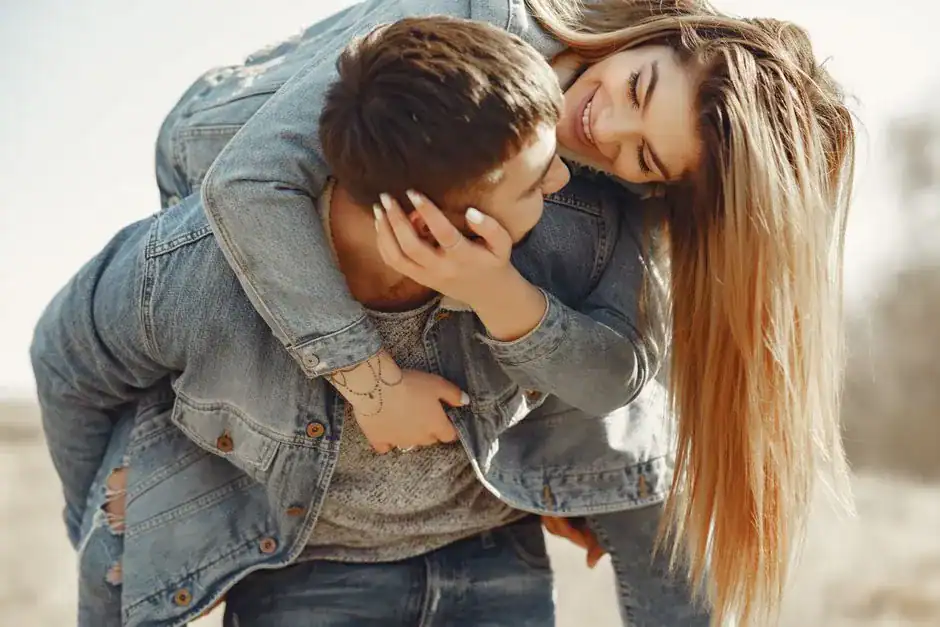 A playful couple laughing together