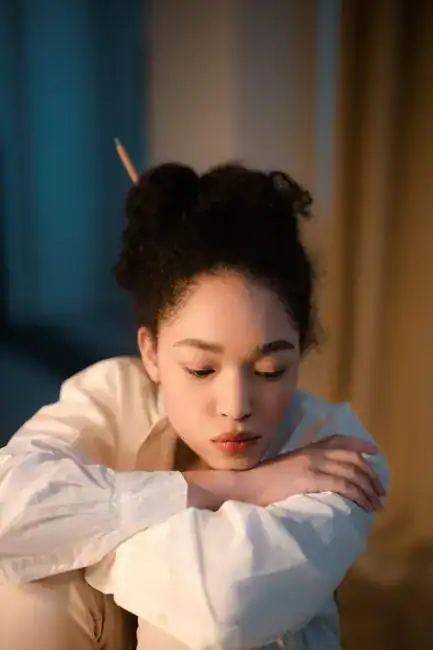 A composed, thoughtful young woman