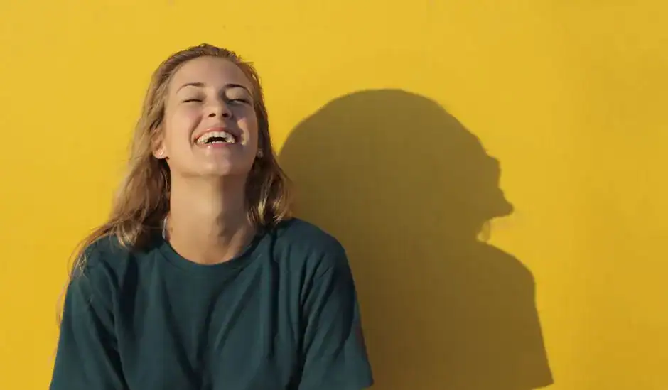 A young woman laughing freely