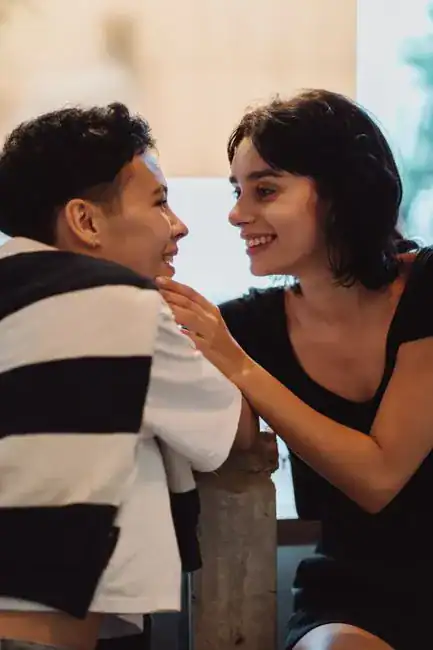 A couple sharing a tender, present moment