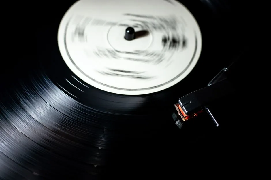 A vinyl record spinning on a turntable