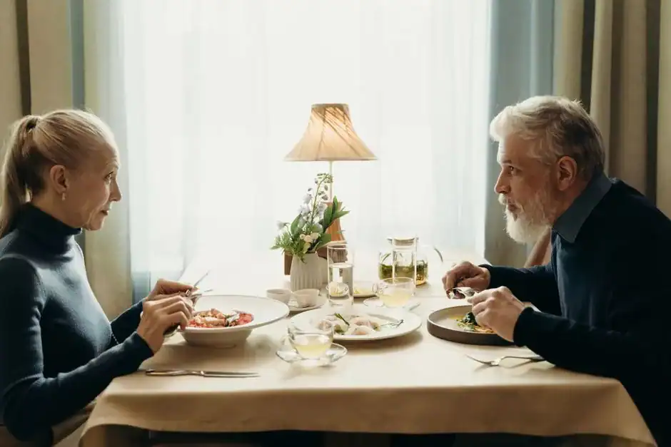 An older couple enjoying a quiet dinner date together