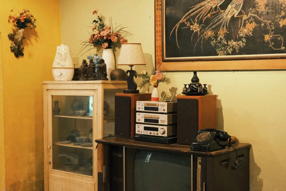 A retro corner with an old console television and stereo